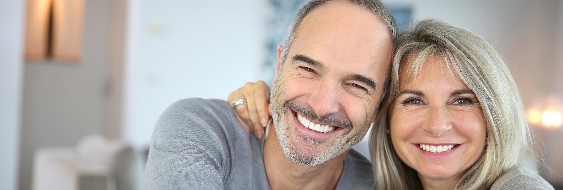 older couple smiling l dental implants in los gatos
