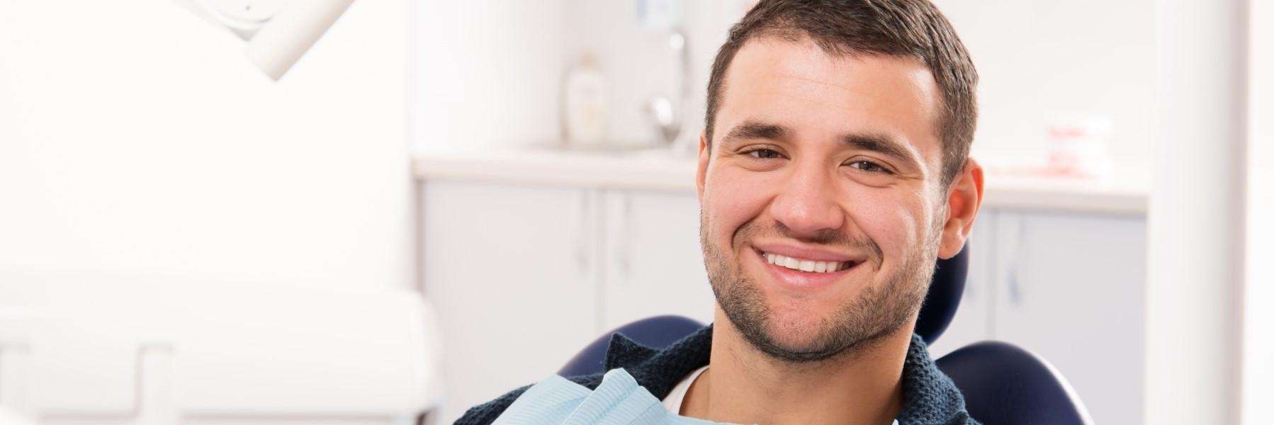 Man smiling in dentist chair, los gatos ca