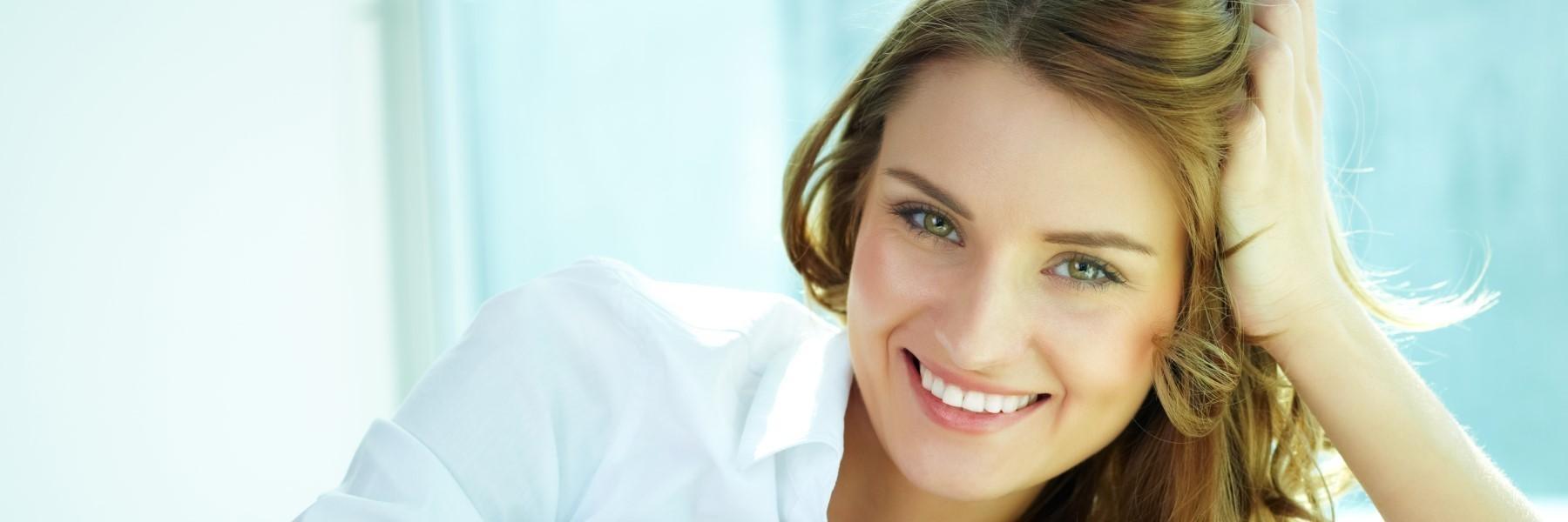 Woman smiling with white shirt | cosmetic dentist los gatos ca